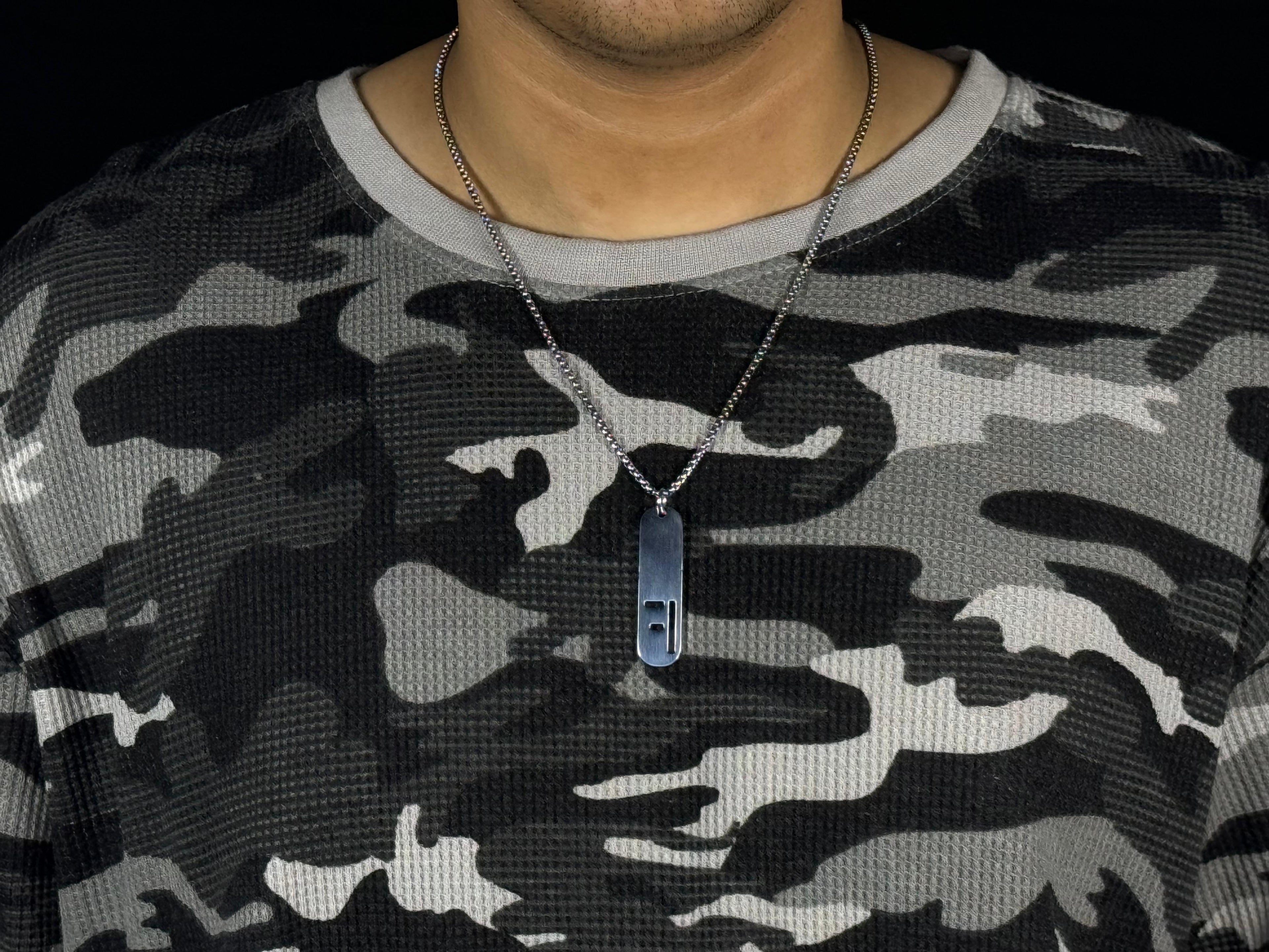 Deadpan Silver Pendant