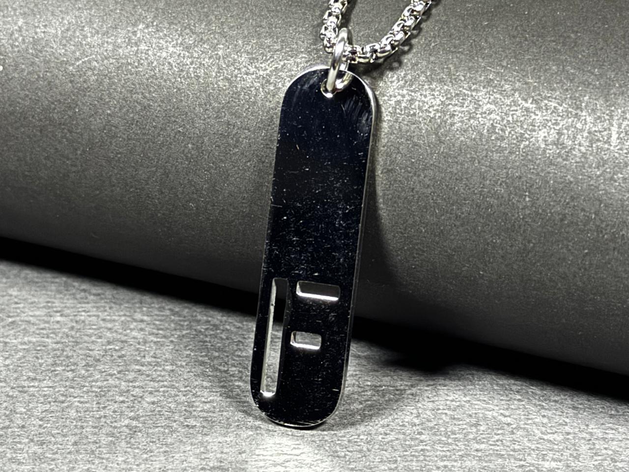Deadpan Silver Pendant