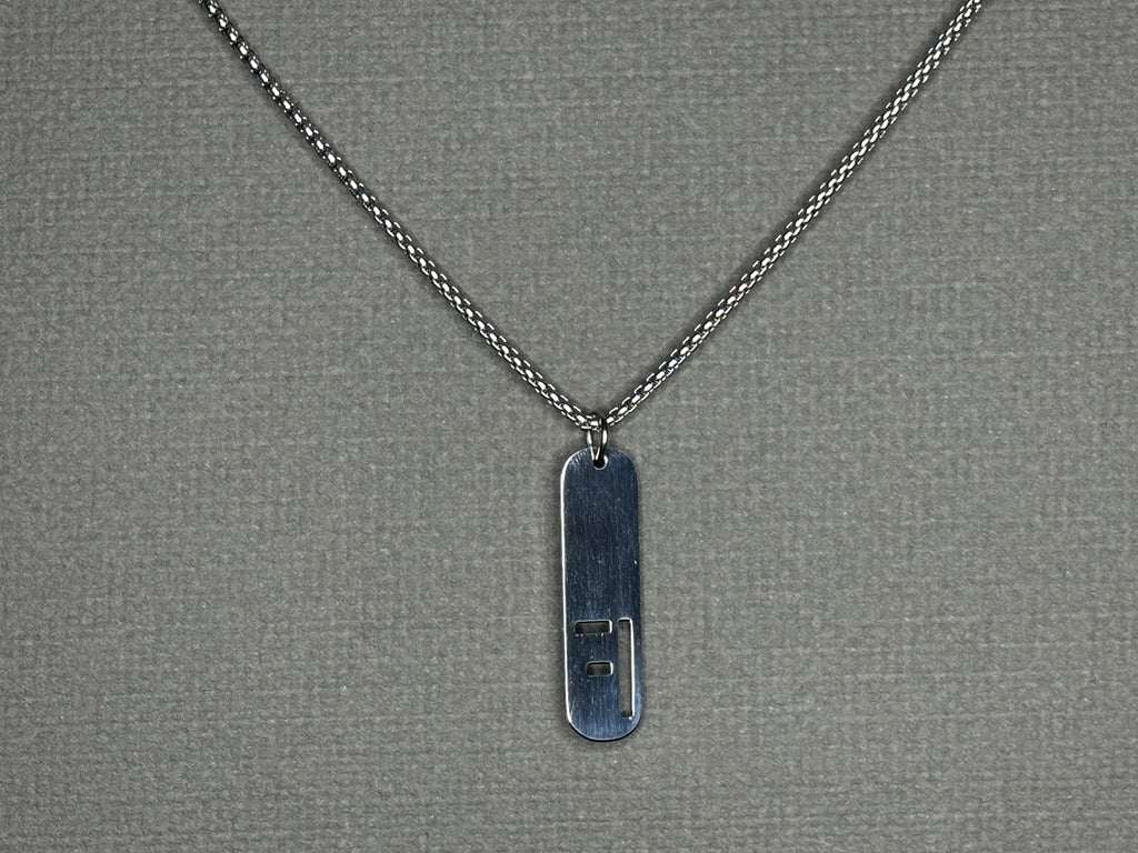 Deadpan Silver Pendant